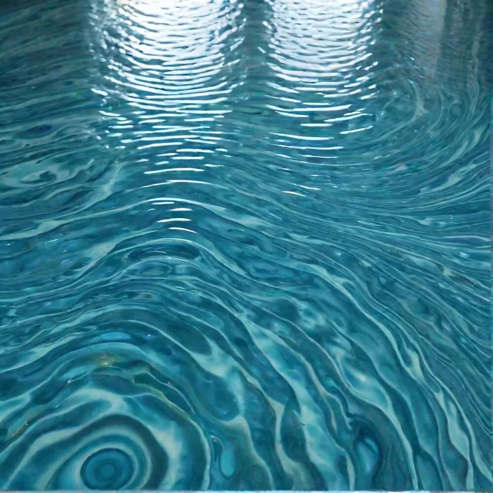 Detailed aqua epoxy floor with a rippled water-like finish